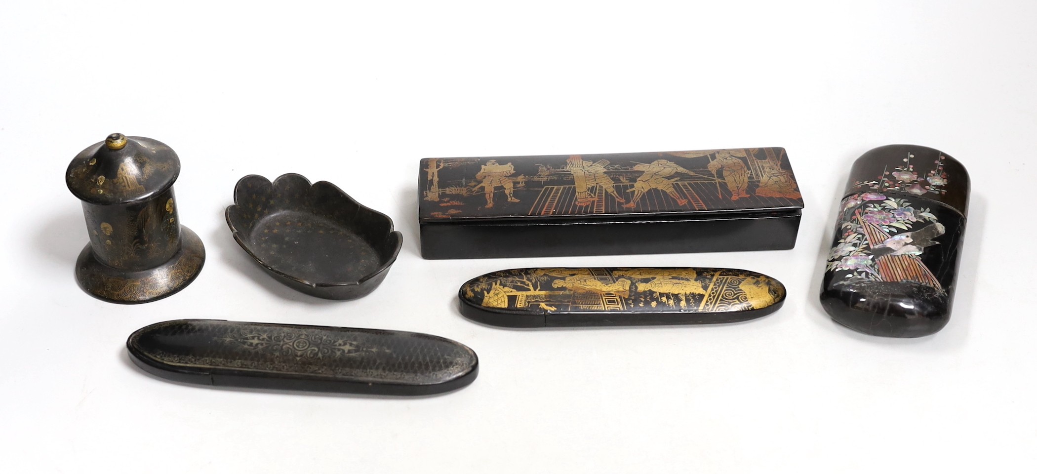 Six items of papier mache, two glasses cases, a cigar case, string box, pin tray and pencil box